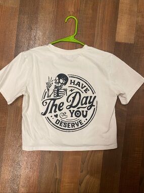 White Graphic Tee with Black Skeleton Peace Hand